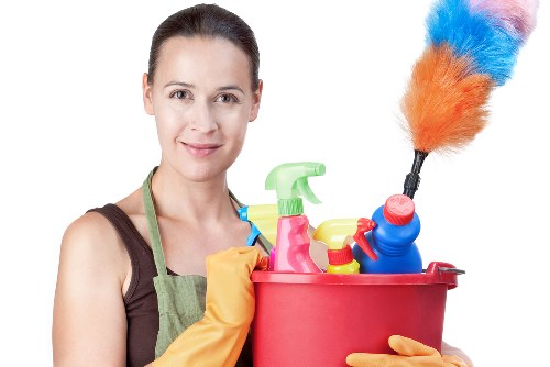 Daily office cleaning tasks on desks and shared areas