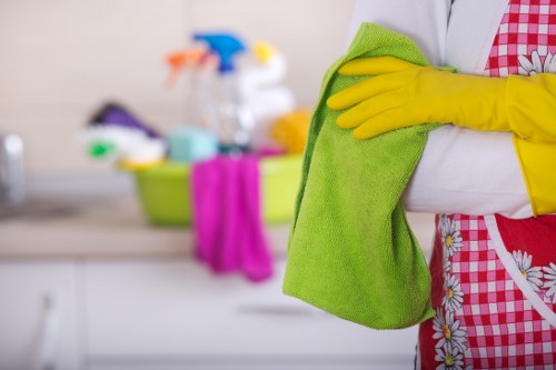 Commercial cleaning crew sanitizing a business workspace
